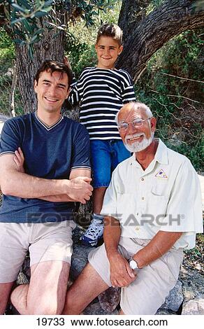 Stock Image - Three generations of men. Fotosearch