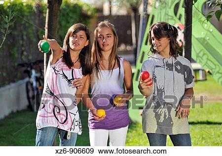 three girls playing boules View Large Photo Image Stock Photo - three girls playing boules. Fotosearch