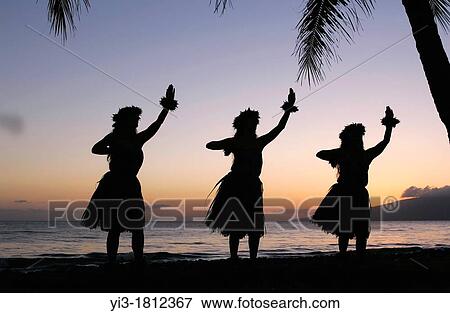 Three hula dancers at Olowalu, Maui, Hawaii framed by palm trees View Large Photo Image Stock Photo - Three hula dancers at Olowalu, Maui, Hawaii framed by palm trees. Fotosearch