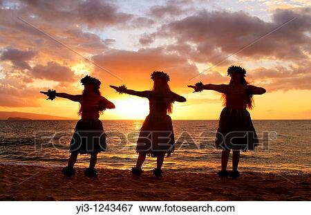 Stock Photo - Three hula dancers at sunset at Palauea, Maui, Hawaii. Fotosearch