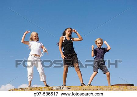 Three kids outdoors. The Baltic sea. Sweden View Large Photo Image Stock Photo - Three kids outdoors. The Baltic sea. Sweden. Fotosearch