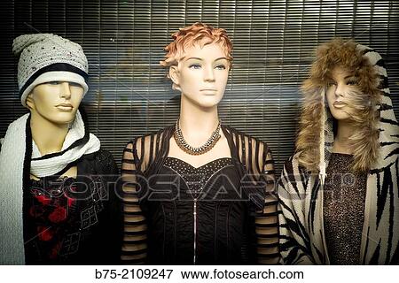 Three mannequins in the window of a fashion store in London, England, Uk, Europe View Large Photo Image Stock Photo - Three mannequins in the window of a fashion store in London, England, Uk, Europe. Fotosearch