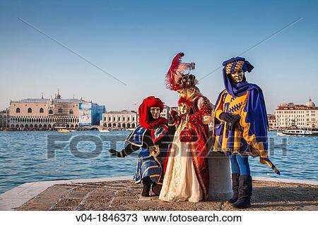 Three masked persons at the carnival in Venice, Italy, Europe View Large Photo Image Stock Image - Three masked persons at the carnival in Venice, Italy, Europe. Fotosearch
