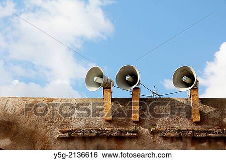 three megaphones on wall in rome italy View Large Photo Image Stock Photograph - three megaphones on wall in rome italy. Fotosearch