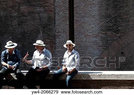 Three men with white hats, Rome, Italy. View Large Photo Image Stock Photo - Three men with white hats, Rome, Italy.. Fotosearch