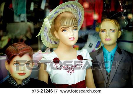 Three old fashioned dressed children mannequins. Southall, London, England, UK View Large Photo Image Stock Photo - Three old fashioned dressed children mannequins. Southall, London, England, UK. Fotosearch
