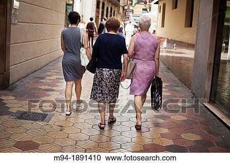 three old women walking View Large Photo Image Stock Image - three old women walking. Fotosearch