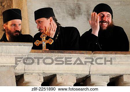 Three Orthodox monks in the Church of the Holy Sepulchre during the Good Friday procession in Jerusalem's Old City. View Large Photo Image Stock Image - Three Orthodox monks in the Church of the Holy Sepulchre during the Good Friday procession in Jerusalem's Old City.. Fotosearch