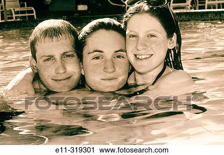 Three teens in swimming pool View Large Photo Image Stock Image - Three teens in swimming pool. Fotosearch