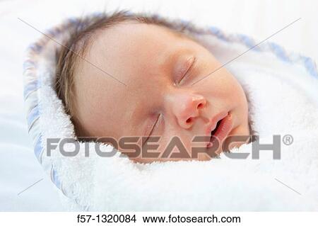 Picture - Three week old baby boy. Fotosearch