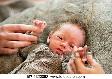 Stock Image - Three week old baby boy. Fotosearch