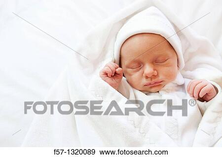 Three week old baby boy View Large Photo Image Stock Photo - Three week old baby boy. Fotosearch