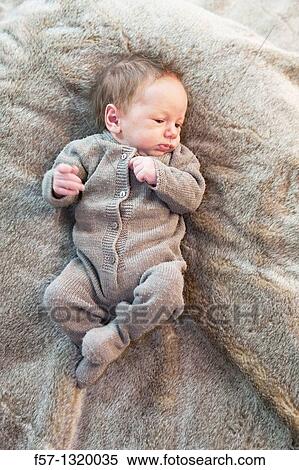 Three week old baby boy View Large Photo Image Stock Photography - Three week old baby boy. Fotosearch
