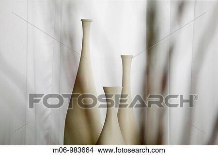 Three White Bottles Behind Veil View Large Photo Image Picture - Three White Bottles Behind Veil. Fotosearch