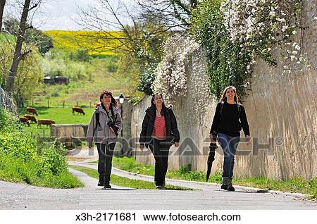 three women walking outside the village of Houdan, Yvelines department, Ile-de-France region, France, Europe. View Large Photo Image Stock Image - three women walking outside the village of Houdan, Yvelines department, Ile-de-France region, France, Europe.. Fotosearch