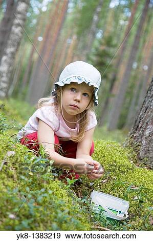 Stock Photo - Three Year Old Berry-Picker Girl in Forest. Fotosearch