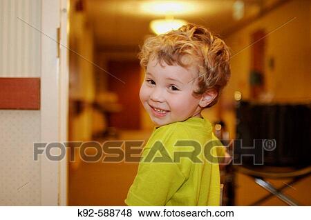 Three-year-old boy leaving a hospital View Large Photo Image Stock Photo - Three-year-old boy leaving a hospital. Fotosearch