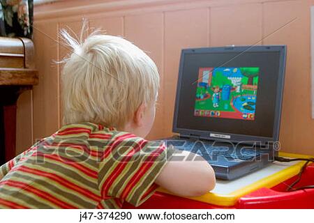 Three year old child at nursrey learning on the computer View Large Photo Image Stock Image - Three year old child at nursrey learning on the computer. Fotosearch