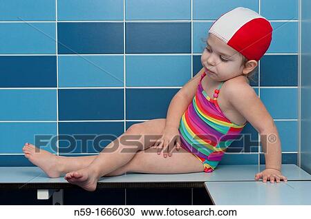 Three year old girl at swimming pool ready for a swimming lesson View Large Photo Image Stock Image - Three year old girl at swimming pool ready for a swimming lesson. Fotosearch