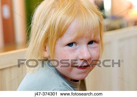 Three year old girl looking into camera, cheeky little smile View Large Photo Image Stock Image - Three year old girl looking into camera, cheeky little smile. Fotosearch