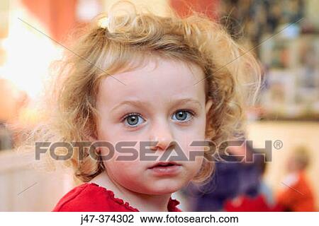 Three year old girl looking into camera, serious expression View Large Photo Image Stock Image - Three year old girl looking into camera, serious expression. Fotosearch