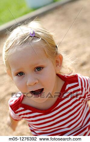 Three years old toddler playing at the playground View Large Photo Image Stock Image - Three years old toddler playing at the playground. Fotosearch