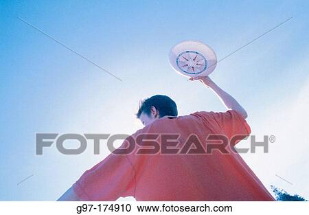 Throwing frisbee View Large Photo Image Stock Image - Throwing frisbee. Fotosearch