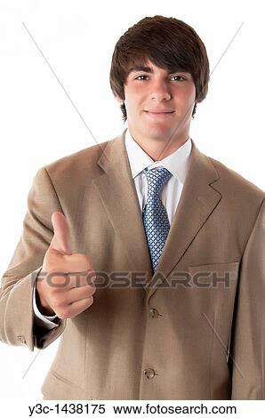 Stock Photography - Thumb up - young man representing success. Fotosearch