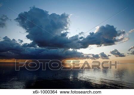 Picture - Thunder Clouds over Wadden Sea at Dawn, Texel Island, Holland. Fotosearch