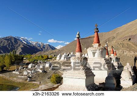 Tibetan stupas at the foot of Stok Royal Palace, residence of the Namgyal dynasty, Ladakh region, state of Jammu and Kashmir, India, Asia View Large Photo Image Stock Photograph - Tibetan stupas at the foot of Stok Royal Palace, residence of the Namgyal dynasty, Ladakh region, state of Jammu and Kashmir, India, Asia. Fotosearch