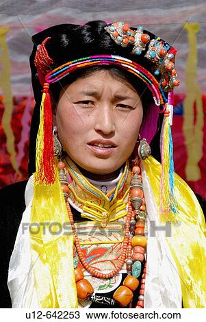Tibetan traditional clothes at a wedding. Danba. Sichuan View Large Photo Image Stock Image - Tibetan traditional clothes at a wedding. Danba. Sichuan. Fotosearch