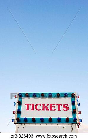 Stock Image - Ticket booth against blue sky. Fotosearch