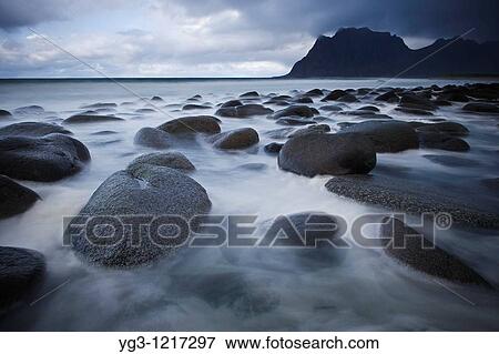 Tidal rock at Utakleiv beach, Vestvagoy, Lofoten islands, Norway View Large Photo Image Stock Photo - Tidal rock at Utakleiv beach, Vestvagoy, Lofoten islands, Norway. Fotosearch
