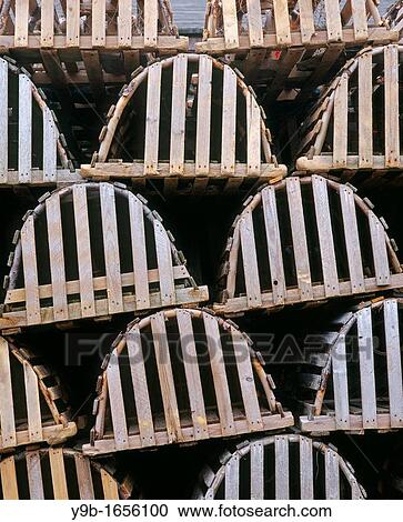 Tidy stack of wooden lobster traps, Trout River, western Newfoundland, Canada View Large Photo Image Stock Image - Tidy stack of wooden lobster traps, Trout River, western Newfoundland, Canada. Fotosearch
