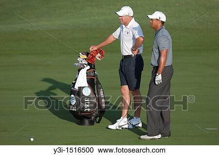 Tiger Woods and caddie Steve Williams wait for the green to clear before Tiger hits his 2nd shot on the par 4 4th hole during his practice round on Tuesday, May 5, 2009 for the Players Championship View Large Photo Image Stock Image - Tiger Woods and caddie Steve Williams wait for the green to clear before Tiger hits his 2nd shot on the par 4 4th hole during his practice round on Tuesday, May 5, 2009 for the Players Championship. Fotosearch