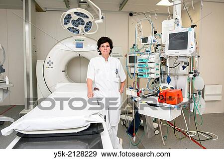 Tilburg, Netherlands. Portrait of the trauma and a hospitals first aid doctor, Mrs. Linda D, in her working environment: the first aid's trauma room. View Large Photo Image Stock Photo - Tilburg, Netherlands. Portrait of the trauma and a hospitals first aid doctor, Mrs. Linda D, in her working environment: the first aid's trauma room.. Fotosearch
