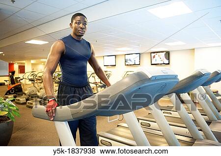 Tilburg, Netherlands Young African-American working out in the gym View Large Photo Image Stock Photo - Tilburg, Netherlands Young African-American working out in the gym. Fotosearch