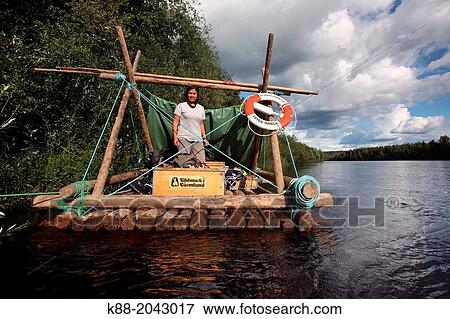 Stock Photo - Timber rafting on Klar Alven. Varmland, Sweden.. Fotosearch