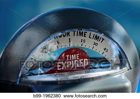 Stock Image - TIME EXPIRED ON ANALOG MECHANICAL PARKING METER.. Fotosearch