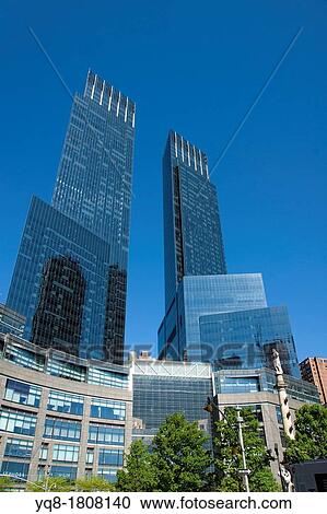 Stock Image - Time Warner Center and the Columbus Monument at Columbus Circle in Manhattan, New York, USA.. Fotosearch