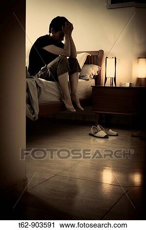 Times of crisis Young woman thinks alone in his room Color View Large Photo Image Stock Image - Times of crisis Young woman thinks alone in his room Color. Fotosearch