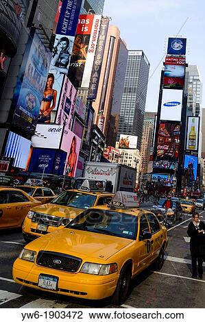 Times Square with taxi cabs, New York, USA View Large Photo Image Stock Image - Times Square with taxi cabs, New York, USA. Fotosearch