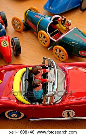 Tin cars, toys. View Large Photo Image Stock Photograph - Tin cars, toys.. Fotosearch