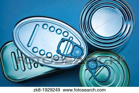 Stock Photo - Tins of different sizes and opening. Fotosearch