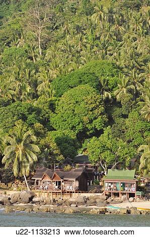 Stock Image - Tioman (Malaysia): bungalows at Salang Beach. Fotosearch