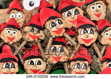 Tions de Nadal (Christmas logs), Catalan tradition, for sale at fair. Fira de Santa Llcia, Barcelona, Catalonia, Spain. View Large Photo Image Stock Photography - Tions de Nadal (Christmas logs), Catalan tradition, for sale at fair. Fira de Santa Llcia, Barcelona, Catalonia, Spain.. Fotosearch