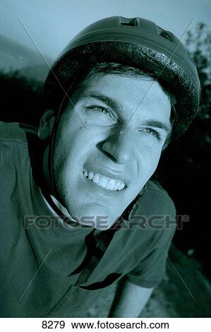 Tired man with helmet View Large Photo Image Stock Photo - Tired man with helmet. Fotosearch