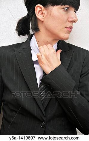 Tired young businesswoman View Large Photo Image Stock Photo - Tired young businesswoman. Fotosearch