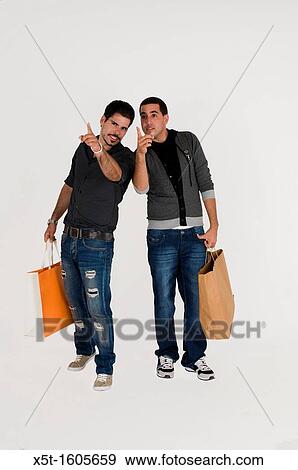 to male friends out shopping together View Large Photo Image Stock Photo - to male friends out shopping together. Fotosearch