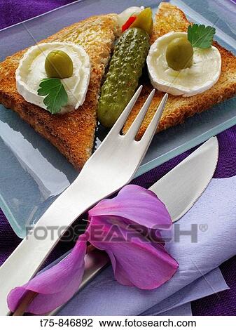Toast with goat cheese and salted View Large Photo Image Stock Image - Toast with goat cheese and salted. Fotosearch